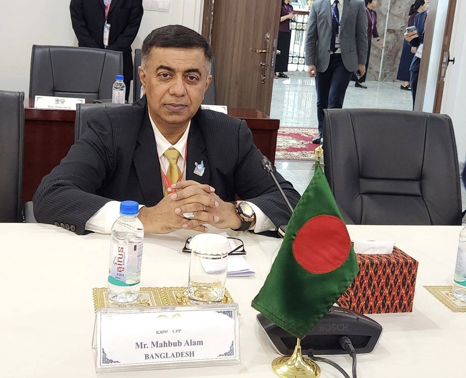 Mahbub Alam seated at an ICAPP conference table representing Bangladesh