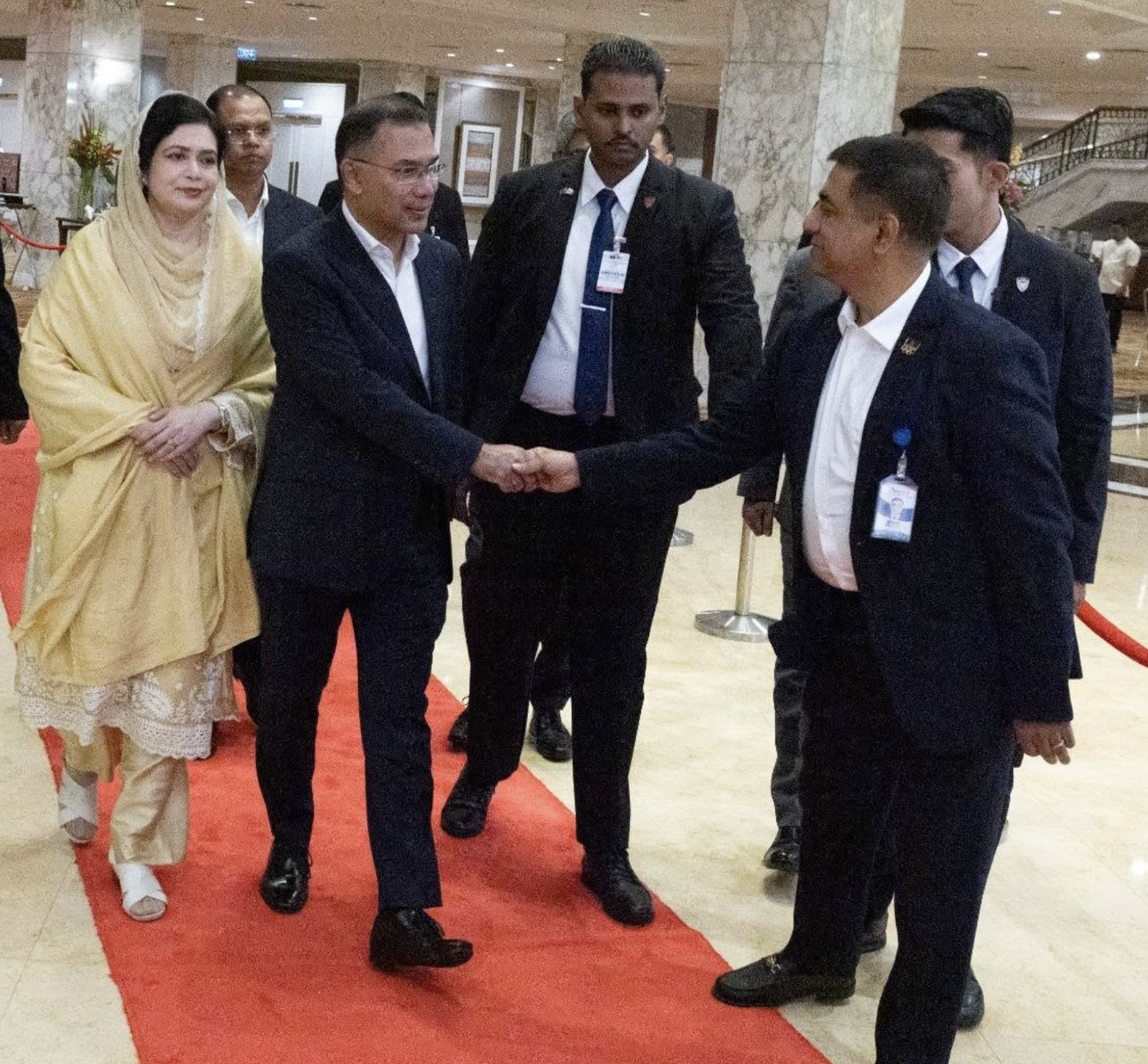 Mahbub Alam greeted at an official reception on a red carpet